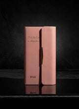 Load image into Gallery viewer, Pink wallet with gold accents on a light gray background