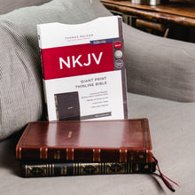 Load image into Gallery viewer, Clearance sale 2026, NKJV Holy Bible, Giant Print Thinline Bible, Brown Leathersoft, Thumb Indexed, Red Letter, Comfort Print: New King James Version by Thomas Nelson Publishers (Author)  Format: Imitation Leather
